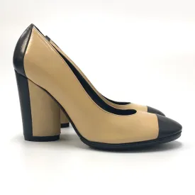 Chanel Nude and Black Heels
