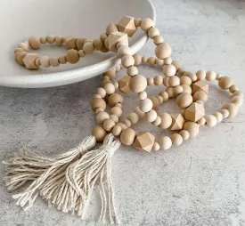 Geometric wood bead garland with tassels