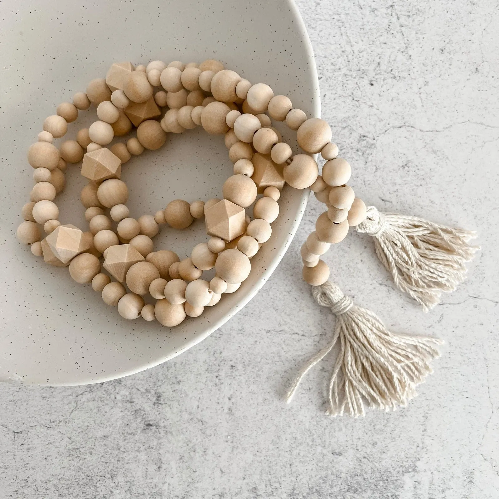 Geometric wood bead garland with tassels