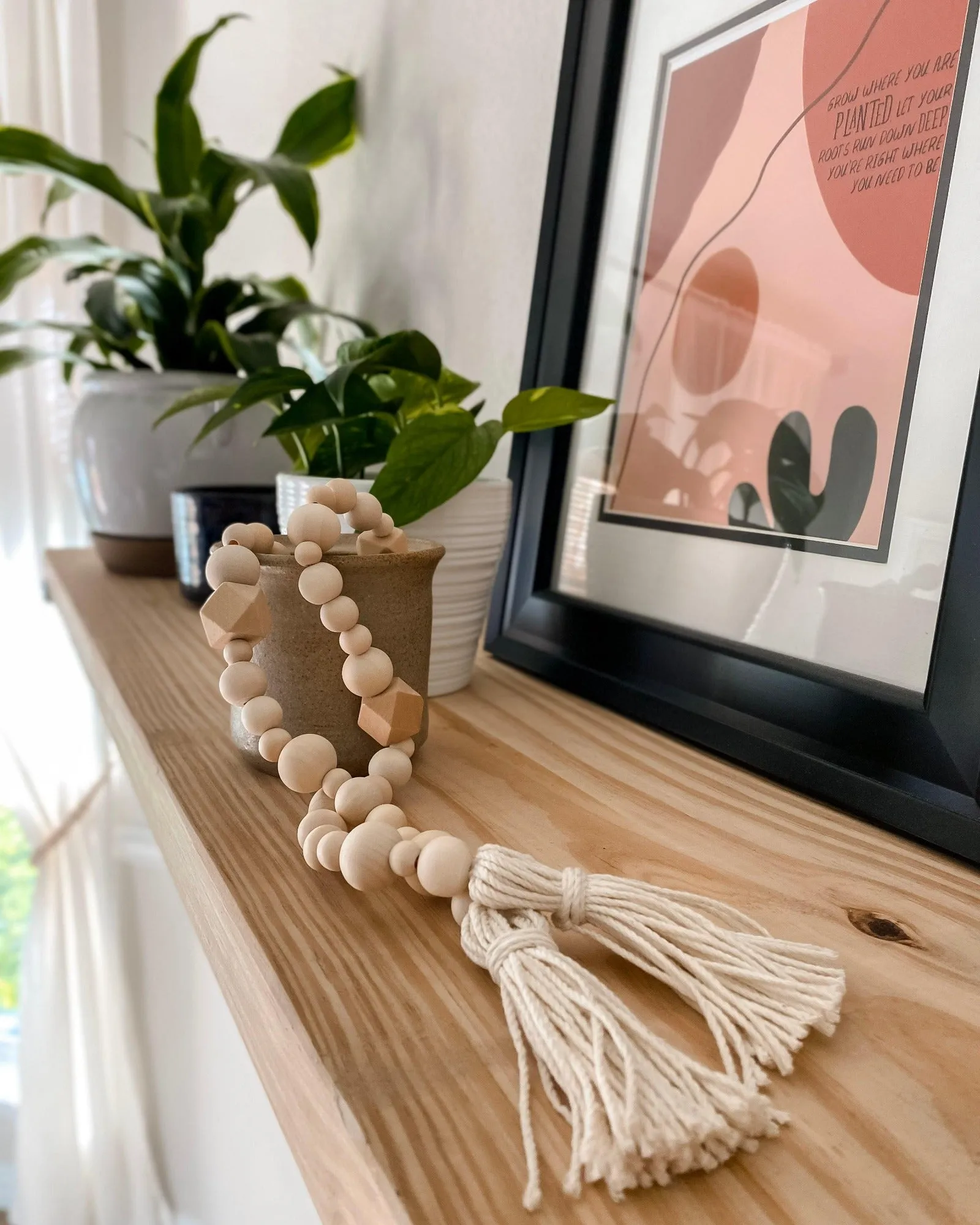 Geometric wood bead garland with tassels