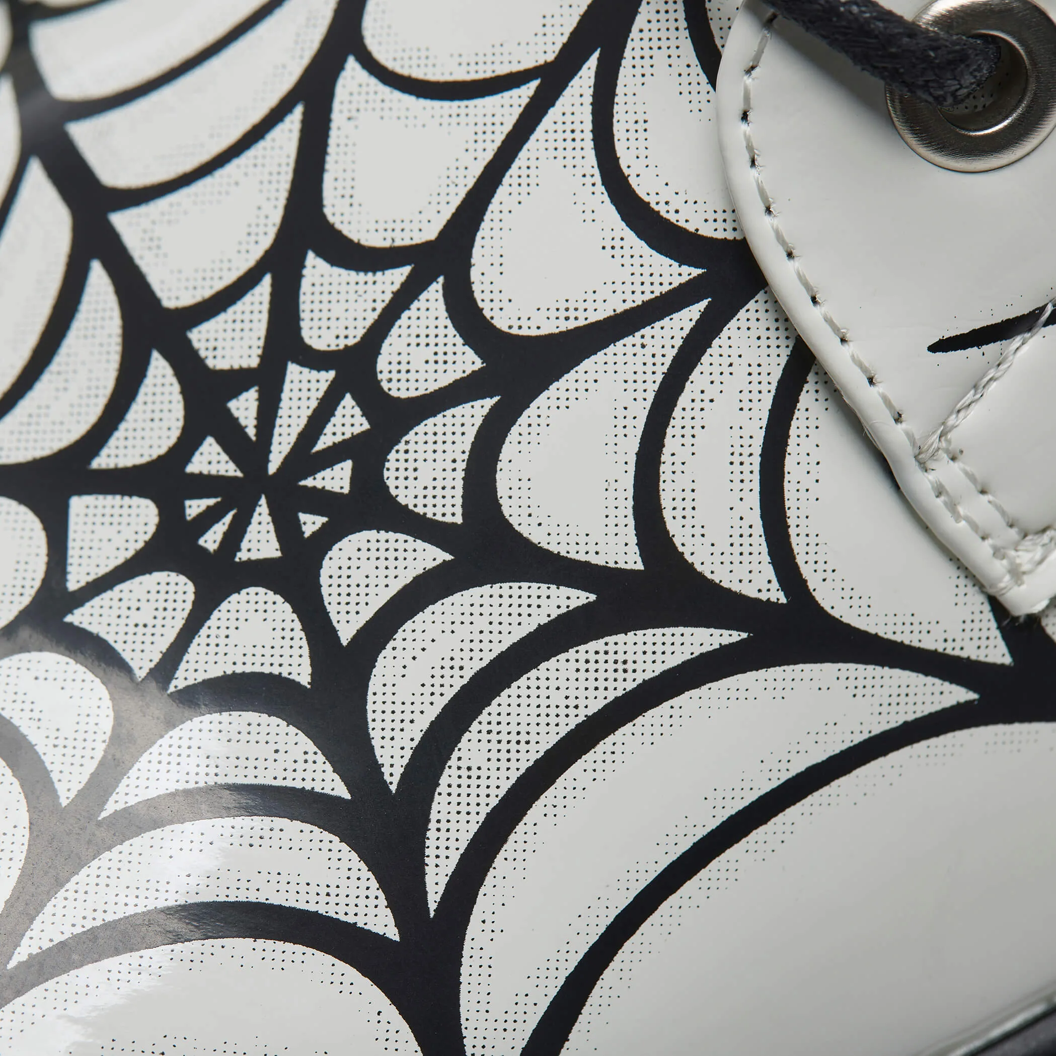 Web Trap Trident Boots